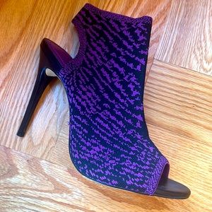 Never worn, 4” stiletto. Upper is black and purple knit, from Zara, size 8.